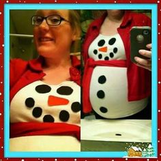 a pregnant woman wearing a snowman costume taking a selfie with her cell phone