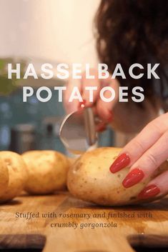 a woman cutting potatoes on top of a wooden table