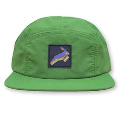 a green hat with an embroidered unicorn on the front and rainbows on the back