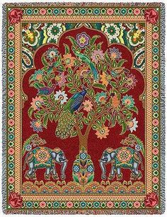 a tapestry with an elephant and tree in the middle, surrounded by colorful flowers and leaves