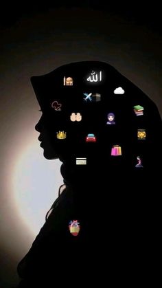 the silhouette of a person's head with many icons projected on it in front of a black background