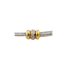 Roberto Coin 18K Yellow and White Gold Diamond Choker Collar Necklace  This classic Roberto Coin choker is set in 18K yellow and white gold  Center of the necklace is set with 75 round brilliant diamonds.  Diamonds are approx. .75cts and of VS1 clarity, F color  Choker is approx. 16" in length and 5 mm wide  Stamped *1226 VI Italy 750  26.0 dwt  40.4 g  Very good preowned condition. Comes with original Roberto Coin box Yellow Gold Diamond Bracelet With Pavé Setting For Anniversary, Yellow Gold Diamond Bracelet With Pave Setting For Anniversary, Classic Hand Set Yellow Gold Diamond Necklace, Gold Diamond Choker, Coin Choker, Choker Collar Necklace, Diamond Choker, Roberto Coin, Choker Collar