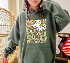 Vintage Flowers Hoodie, Boho Wildflowers Hoodie,Watercolor Floral Hoodie,Wildflowers Floral Hoodie,Meadow Flowers Hoodie,Summer Fall Flowers   PRODUCT DETAILS 💫Youth Hoodies do not have drawcord for added safety💫 - Our hoodies are made for comfort with a 50% cotton and 50% polyester blend. - They're built to last with a medium-heavy fabric  (8.0 oz/yd² (271 g/m - Enjoy a relaxed fit and a sewn-in label. - Get the right size with our true-to-size guide.   SIZING - Find your perfect fit in our s Green Hooded Hoodie For Spring, Green Relaxed Fit Hoodie For Spring, Green Spring Hoodie With Drawstring Hood, Green Hoodie With Drawstring For Spring, Green Hoodie For Spring, Green Hoodie Sweatshirt For Spring, Green Casual Spring Hoodie, Digital Wardrobe, Painting Hoodie