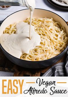 an easy vegan alfredo sauce in a skillet with the title overlay that reads, easy vegan alfredo sauce