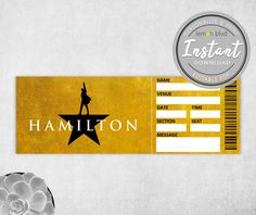 a ticket with the name of a person on it and a badge that says,'hamilton