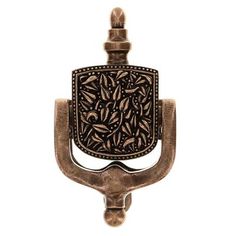 a metal hook with an ornate design on it