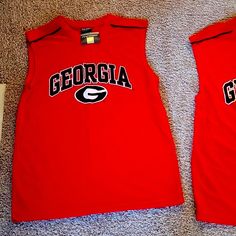 Attention Uga Fans, I Have Two Sleeveless Jersey Style Shirts Available For An Awesome Deal. Never Worn And Brand New. Get Dad A Shirt This Father's Day. - Size Large, New With Tag - Size Xxl, New With Tag Casual Sleeveless Tank Top For College, Collegiate Cotton Sleeveless Tank Top, Collegiate Sleeveless Cotton Tank Top, Cotton Sleeveless Collegiate Tank Top, Collegiate Sleeveless Cotton Top, Sporty Sleeveless Tops For College, Team Spirit Red Sleeveless Tops, Red Sleeveless Tops For College, Red Sleeveless College Tops