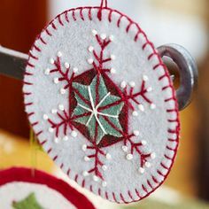 an ornament is hanging from a hook