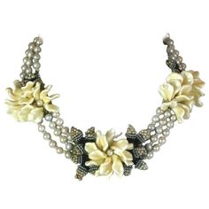 Miriam Haskell freshwater faux pearl flower station necklace. Lovely pearlized petals are sewn in stations with contrasting black, grey and seed pearl "leaves", all mounted on signature Haskell silver gilt filigrees. 1950's USA. Good condition. Some loss of pearling on petals of flowers. Adjusts from 14 to 16.5", Width 1.75". Flower Station, Costume Jewelry Makers, Grey Necklace, Coin Pearl Necklace, Funky Necklace, Necklaces Beaded, Smoky Quartz Necklace, Miriam Haskell Jewelry, Vintage Beads Necklace