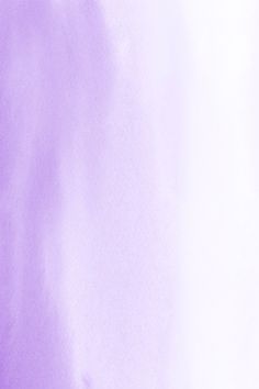 a purple and white background with watercolor stains