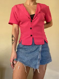 "Cutest vintage 80s/90s barbie pink blouse featuring scalloped hem, short sleeves, and geometric buttons. Made of 100% silk by Christie & Jill brand. This material is sooo comfy and the top is in fantastic shape; no tears, stains, or obvious wear.  Tag size 8, true to size. Best fits women's M/L.  Measurements (measured flat across, unstretched): Pit to pit = 21\" Bust = 20\" (40\" doubled) Sleeve length = 8\" Shoulder to shoulder =16.5\" Shoulder to bottom hem = 21\" Model is 5'3\" with a 26\" waist and 32\" bust, garment is shown pinned to model's size.  Please read description carefully and view all photos. I describe and photograph all condition issues that I am aware of. I do my best to research and give the most accurate information regarding the item, but no one is perfect! Please d 90s Barbie, Silk Button Up, Scalloped Hem, Pink Blouse, Short Sleeve Blouse, Womens Clothing Tops, Clothing Items, Vintage 90s, Hot Pink