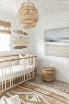 a baby's room with surfboards on the wall