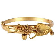 Unusual Victorian bangle commemorating the South African Gold Industry. Crossover style with mining motifs. Large size. 1890's. Excellent condition Luxury Victorian Bangle For Anniversary, Luxury Victorian Style Bangle Jewelry, African Gold, South African, The South, Bangle Bracelet, Rose Gold Ring, Crossover, Fashion Art