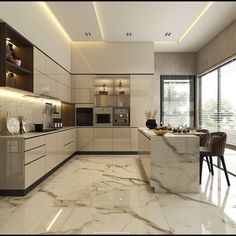 a modern kitchen with marble counter tops and white cabinets