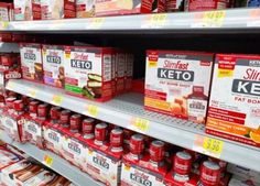 the shelves are full of keto and other foods for sale in a grocery store