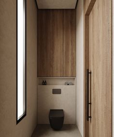 a bathroom with wooden walls and a toilet in the middle, next to a window