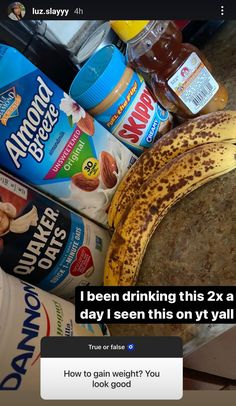 a banana sitting on top of a counter next to other food and drink items,