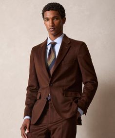 Brown Wool Suits With Suit Collar, Tailored Brown Blazer, Brown Fitted Business Sport Coat, Brown Fitted Timeless Sport Coat, Fitted Brown Sport Coat For Business, Tailored Brown Tweed Jacket With Pressed Crease, Fitted Brown Suit, Timeless Brown Semi-formal Suits, Timeless Semi-formal Brown Suit