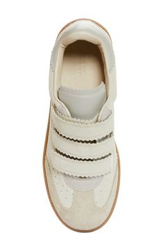 Playful pinking traces the contours of a street-chic suede sneaker styled with a low-top profile and subtle perforations racing up the sides. Adjustable hook-and-loop straps Leather upper/leather and textile lining/rubber sole Made in Portugal Designer Shoes Scandinavian Shoes, Cutest Shoes, Dream Wishlist, Contemporary Accessories, Shoe Wishlist, Top Sneakers Women, Brown Sneakers, Sneakers Blue, Designer Clothes For Men