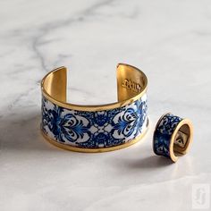 This beautiful Cuff Bracelet and Ring set is a true testament to the artisanal traditions of Tunisia. The intricate designs and patterns of the set are inspired by the country's rich history of mosaics, and the skilled artisan who crafted this set has brought this tradition to life in a truly stunning way. Whether you're looking to add a pop of color to your outfit or simply want to celebrate the vibrant and colorful traditions of Tunisia, this Cuff Bracelet and Ring set is sure to impress. With Circle Mosaic, Bracelet And Ring Set, Bracelet And Ring, Green Circle, Blue Mosaic, Cuff Ring, Cuff Rings, Mosaic Designs, Intricate Designs