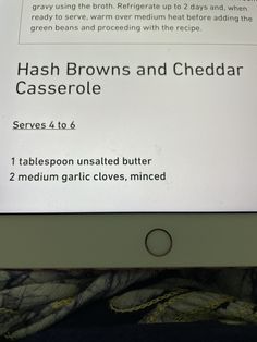 an ipad with hash browns and cheddar casserole on it's screen