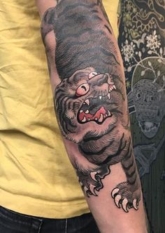 a person with a tattoo on their arm