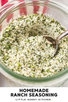 homemade ranch seasoning in a glass jar with a spoon