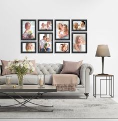 a living room with pictures on the wall and a couch in front of some coffee tables