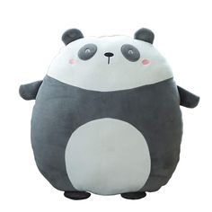 a large stuffed panda bear sitting on top of a white floor