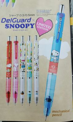 an advertisement for some kind of pen with hello kitty characters on the front and back