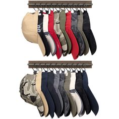 six pairs of socks hanging from hooks on a rail, all in different colors and sizes