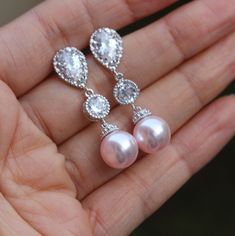 I made this pair using Swarovski pink pearl and zirconia round connector and they are finished with sterling silver ear post. they are 1.4 '' (3.5 cm) long top to bottom . they are also available in sort version . https://www.etsy.com/listing/206019911/blush-pink-pearl-earrings-bridal-pearl? if you want to buy earring and necklace here is the set . https://www.etsy.com/listing/244382700/pink-bridal-set-pink-pearl-bridal Pink Earring, Earring Bridal, Pink Pearl Earrings, Wedding Earring, Bridal Earrings Pearl, Buy Earrings, Pink Bridal, Pearl Earring, Pink Earrings