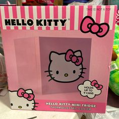 the hello kitty book is open and ready to be used as a decoration for children's birthdays