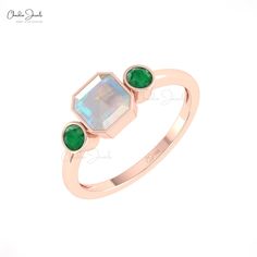 Description Discover the timeless elegance of this Real 14k Gold 3-Stone Genuine Ethiopian Opal & Emerald Gemstone Ring. This stunning trilogy ring features a captivating opal centerpiece flanked by vibrant emeralds, making it a perfect symbol of past, present, and future. Ideal for any occasion. Product Details SKU CJ R 1782 OP Product dimension - Metal 14K Solid Gold Birthstone October OPAL DETAILS Size 6mm Quality AAA Pieces 1 Weight 1.75 carats Stone setting Bezel Enhancement None EMERALD DE Rose Gold Three Stone Jewelry For Anniversary, Three Stone Jewelry For May Birthstone Anniversary, Three Stone May Birthstone Jewelry For Anniversary, Three Stone Jewelry For Anniversary In May Birthstone, Formal Multi-stone May Birthstone Ring, Anniversary Moonstone Multi-stone Ring, Anniversary Multi-stone Moonstone Ring, May Birthstone Three Stone Ring, Fine Jewelry Three Stone May Birthstone Ring