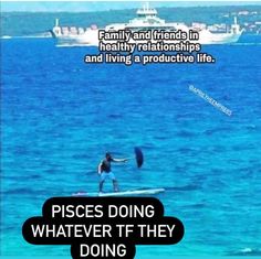 two people on surfboards in the ocean with a ship in the background and an ad for pisces doing whatever they do