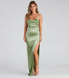 Flaunt your natural beauty in our fabulous Lola dress! She features a trendy pleated square neckline with a slim fit bodice, a floor-sweeping silhouette with a sultry high slit, and a form-hugging fit. Pair this gorgeous dress with a sleek ring set to add some glamour to your look for your special occasion. Green Satin Prom Dress, Sage Green Prom Dress, Green Satin Dress, Green Formal Dresses, Stretch Satin Fabric, Satin Formal Dress, Sage Green Dress, Sage Dress, Mint Dress