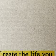 a sign that says create the life you want to live by on a white wall