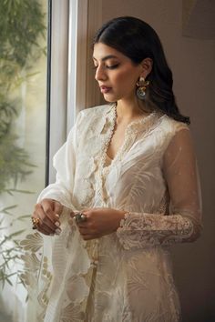 Buy Embellished Pakistani Party Dress Designer Frock Suit in premium quality fabric detailing paired with an embellished dupatta. Customizable. Fast Shipping Designer Frock Suit, Pearls Embroidery, Frock Suit, Cream Suit, Net Design, Pakistani Suit, Cotton Kurti Designs, Desi Clothes, White Patches