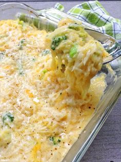 a casserole dish with broccoli and cheese