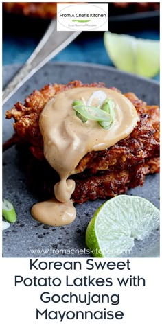 korean sweet potato latkes with mayonnaise sauce on a plate next to lime wedges