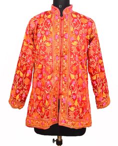 "Item Description From India Kashmiri , this traditional wool jacket heavily embroidered in crewel stitches. Background is ivory with rust and light brown crewel embroidery in traditional Kashmiri floral motif. This is an unusual color scheme for a Kashmiri wool jacket because all the colors are in the same fall palette, resulting in a very classy ombre effect. Measurements: Size Type: Regular Size (Women's): L Decade:1997s Jackets Two Pocket Jackets Bust/Chest Size - \"42\" Inches Jackets Lengt Long Red Jacket, Crewel Stitches, Extra Dress, Embroidery Boho, Fall Palette, Crewel Embroidery, Pocket Jacket, Long Red, Beautiful Saree