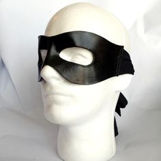 This is a variant of our popular black leather mask, now with a wider design to fit the look of other classic characters! This classic wrap around mask is a great finishing touch for many costumes. Made of molded leather, it fits comfortably to your face and will fit better as you wear it. The ties are stretchy fabric, so it'll fit to your head. The leather gives a great structured look, while the fabric makes it look like the whole thing wraps around while staying comfortable and adjustable.Add Dread Pirate Roberts, Superhero Mask, Cape With Hood, Classic Characters, Costume Masks, Leather Mask, Lone Ranger, Creative Challenge, Costume Mask