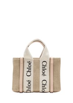 "Find CHLOÉ Woody Mini Tote Bag In Linen With Crossbody Strap on Editorialist. Chloe \"Woody\" tote bag in eco linen and calf leather Branded web top handles Removable, adjustable crossbody strap Open top Lining: linen Approx. 5.5\"H x 7.5\"W x 1.6\"D Professional cleaning recommended Made in Italy" Chloe Woody Tote, Web Top, Mini Tote Bag, Mini Tote, Professional Cleaning, 6 D, Open Top, Crossbody Strap, Cement