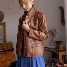 "Vintage bronze brown color 100% real leather classic jacket. In good vintage condition, have some small marks of use. Clean inside and out. Brand \"D&H\". Size M-L Materials : real leather, polyester lining.  Flat measurements: Length from shoulder: 66 cm/ 26\" Armpit to armpit: 55 cm/ 21.6\" 1/2 waist: 52 cm/ 20.4\" Sleeve from shoulder: 59 cm/ 23\" Insleeve : 43 cm/ 17\" Model height 178 cm If you have any questions about sizing, please do not hesitate contact me. All products in my store are Retro Brown Leather Jacket, Retro Brown Leather Outerwear, Vintage Brown Leather Jacket For Fall, Retro Brown Leather Jacket For Fall, Retro Distressed Brown Leather Jacket For Fall, Vintage Distressed Brown Leather Jacket With Pockets, Retro Brown Leather Jacket For Work, Retro Leather Jacket With Pockets, Retro Brown Leather Blazer