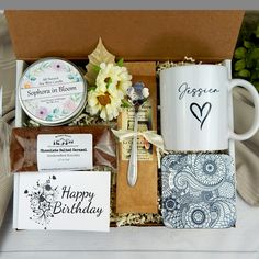 a birthday gift box with coffee, tea, and other personal care items for someone's special occasion