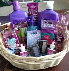 a basket filled with lots of different types of hair care products on top of a wooden table