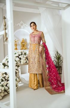 Buy Traditional Pakistani Women's Dress in Pink Color a Royal Pakistani Party Dress. This Traditional Pakistani Women's Dress Can be Customized on Demand. Bollywood Style Gold Dress For Diwali, Gold Bollywood Dress For Diwali, Yellow Bollywood Gown With Dabka Work, Traditional Yellow Gown With Intricate Embroidery, Gold Dress With Intricate Embroidery For Festive Occasions, Yellow Gown With Dabka Work In Traditional Drape, Yellow Anarkali Gown With Dabka Work, Elegant Yellow Lehenga With Dabka Work, Unstitched Gold Gown With Dabka Work