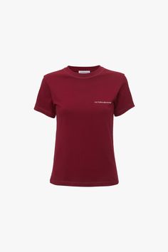 a women's t - shirt with an embroidered logo on the chest and short sleeves