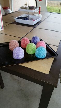 there are several balls on the table ready to be eaten