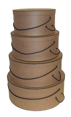 a stack of brown cardboard boxes with black lines on the top and bottom, all stacked up